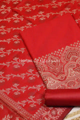 Banarasi Unstitched Dress Material in Red and with plain body and resham border and diagonally striped resham dupatta – product