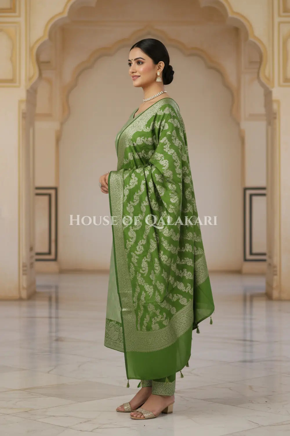 Banarasi Silk Unstitched Dress Material in Sage Green and Green contrast with Intricate Zari Buti – side pose