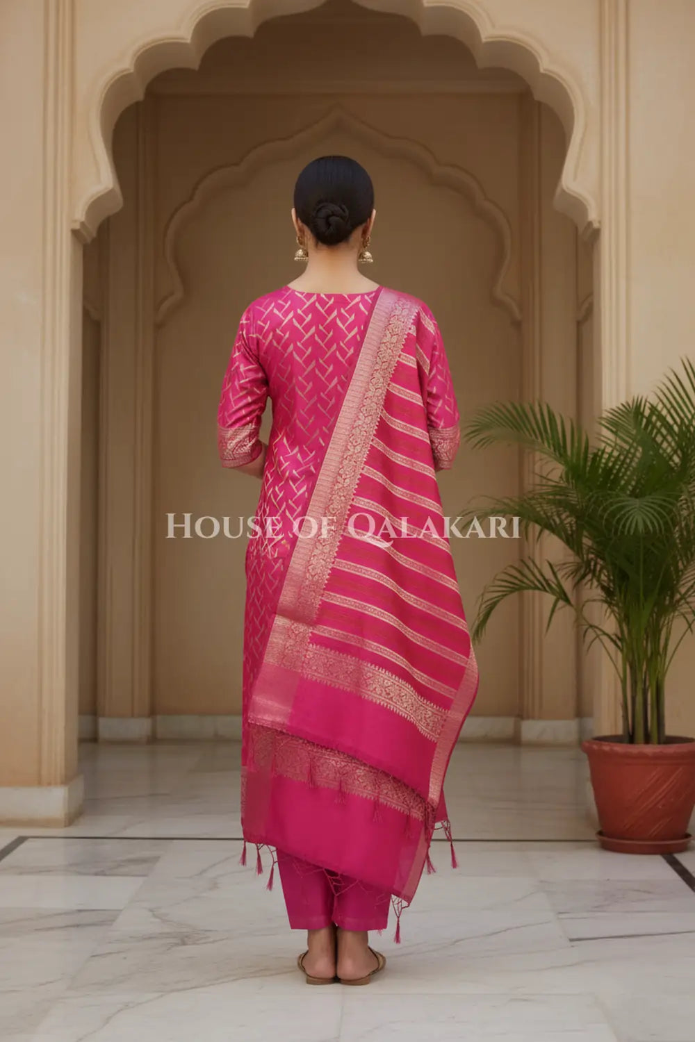 Banarasi Chanderi Cotton Unstitched Dress Material in Rani Pink and with matching horizontal zari stripe dupatta – back pose