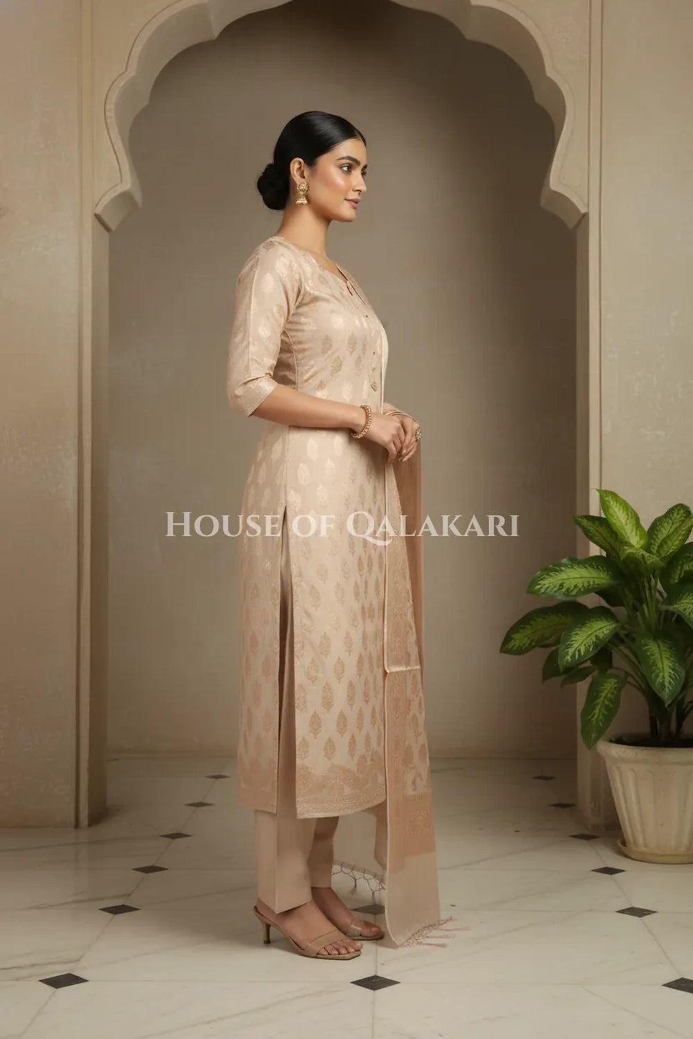 Banarasi Chanderi Cotton Unstitched Dress Material in Champagne beige with intricate Zari Buti work – side pose