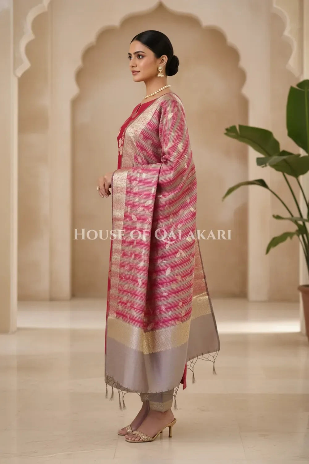 Banarasi Cotton Silk blend Unstitched Dress Material in rani pink and silver grey contrast with Intricate Zari Buti – side pose