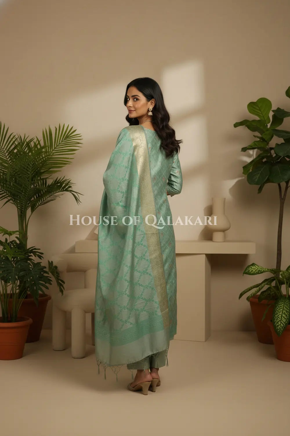 Banarasi Unstitched Dress Material in Grey Olive -Sea Green diamond Chokdi resham work kurta and zari border – back pose