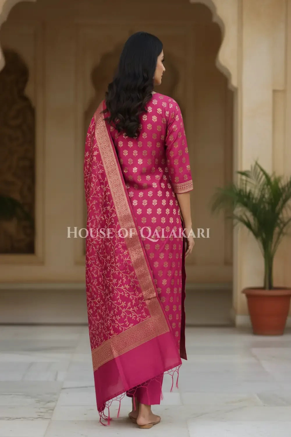 Banarasi Cotton Silk blend Unstitched Dress Material in Rani Pink and with matching floral vine jaal dupatta – back pose