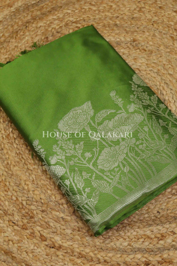 Banarasi silk Unstitched Dress Material in Light Olive Green and with lotus floral border and diagonal striped zari work dupatta – kurta