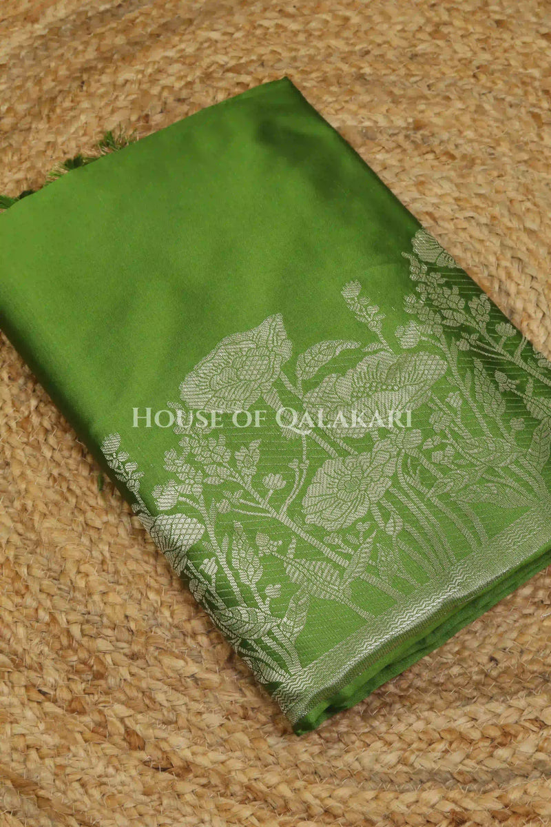 Banarasi silk Unstitched Dress Material in Light Olive Green and with lotus floral border and diagonal striped zari work dupatta – kurta