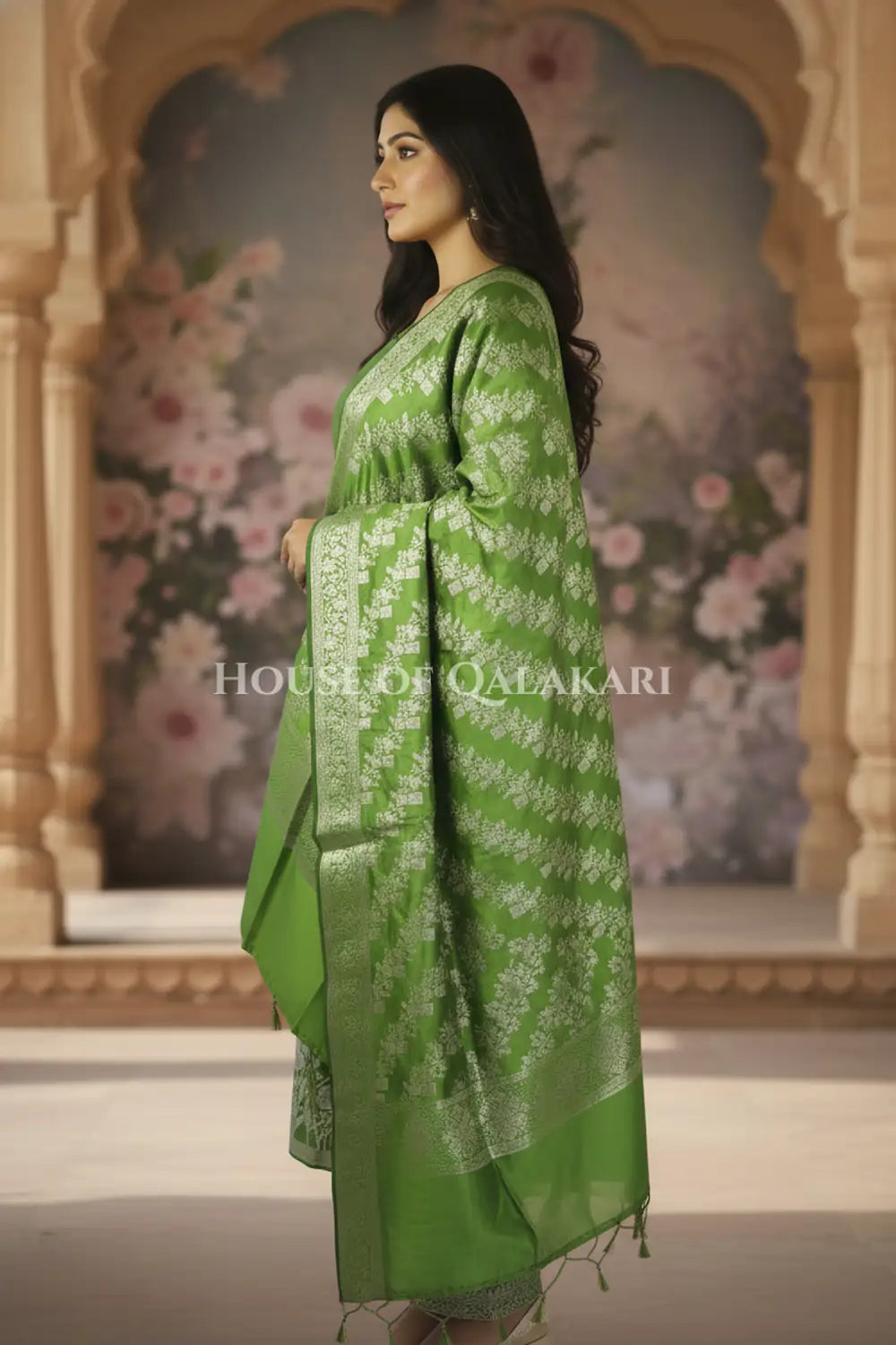 Banarasi silk Unstitched Dress Material in Light Olive Green and with lotus floral border and diagonal striped zari work dupatta – side pose