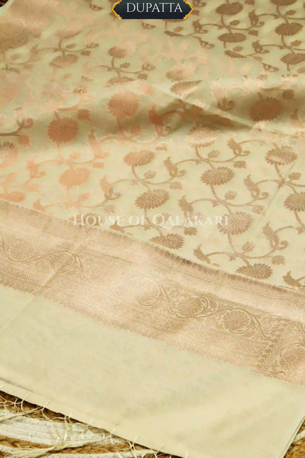 Banarasi Chanderi Cotton Unstitched Dress Material in Cream with intricate Zari Buti work – dupatta
