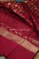 Banarasi silk Unstitched Dress Material in Olive Green and Wine Red contrast with Intricate Zari Buti – dupatta