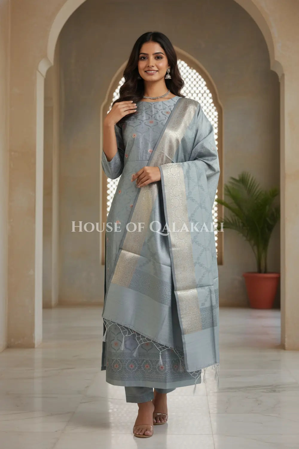 Banarasi Chanderi Cotton Unstitched Dress Material in Grey and with matching floral vine jaal dupatta – festive pose