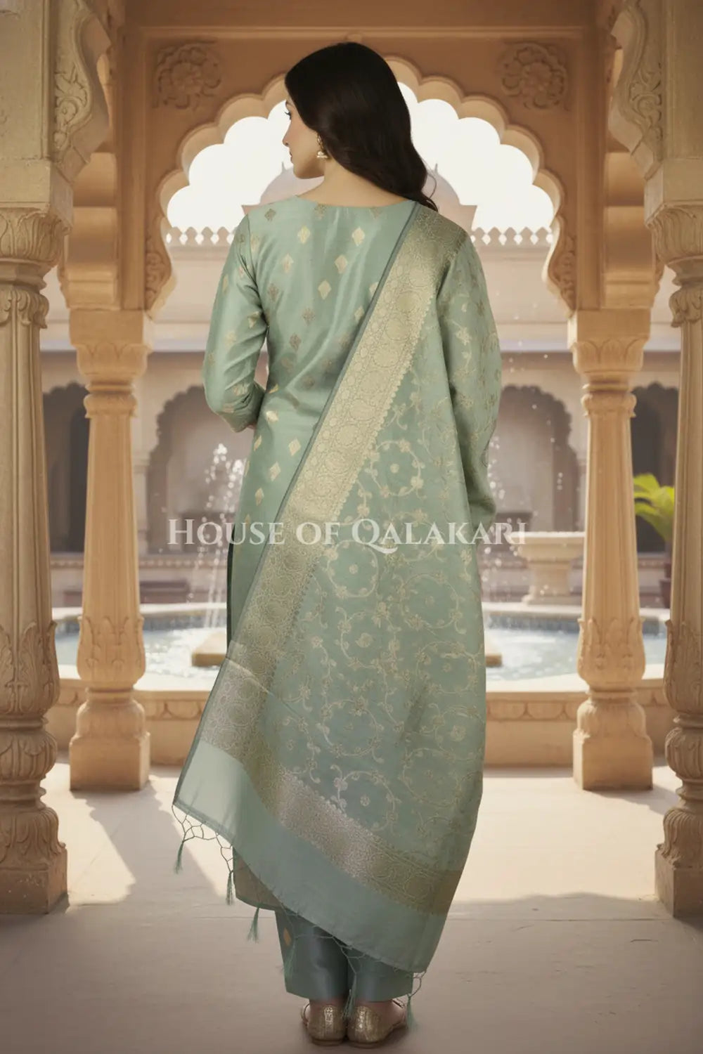 Banarasi Cotton Silk blend Unstitched Dress Material in Antique Aqua green colour with Intricate Zari Diamond Buti – back pose