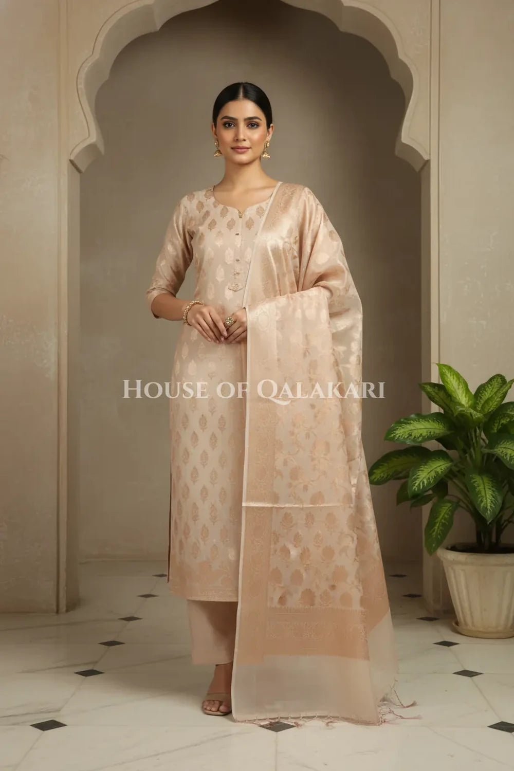 Banarasi Chanderi Cotton Unstitched Dress Material in Champagne beige with intricate Zari Buti work – front pose