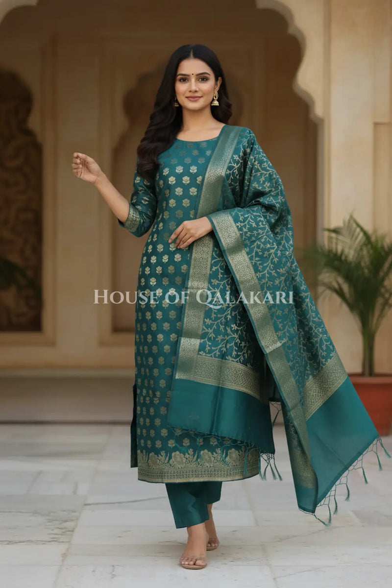 Banarasi Cotton Silk blend Unstitched Dress Material in Deep Teal Green and with matching floral vine jaal dupatta – festive pose