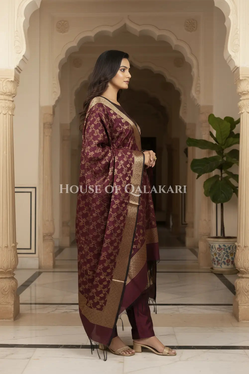 Banarasi Unstitched Dress Material in Velvet Maroon plain kurta and zari border along with floral zari jaal dupatta – side pose