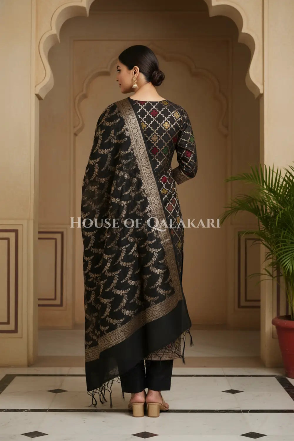 Banarasi Chanderi Cotton Unstitched Dress Material in Black and with matching floral vine jaal dupatta – back pose