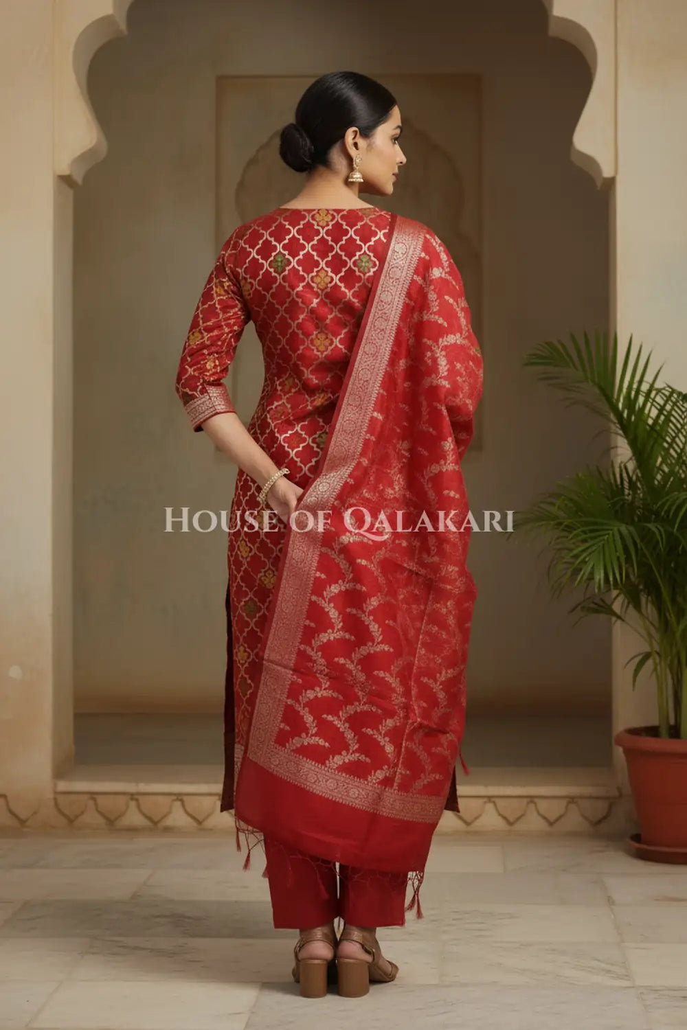 Banarasi Chanderi Cotton Unstitched Dress Material in Red and with matching floral vine jaal dupatta – back pose