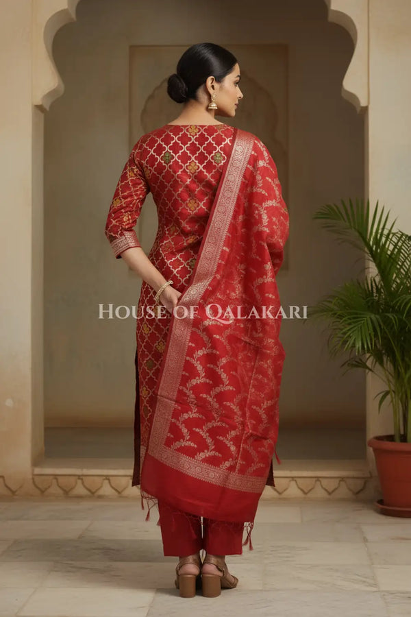 Banarasi Chanderi Cotton Unstitched Dress Material in Red and with matching floral vine jaal dupatta – back pose