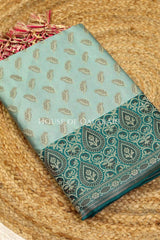 Banarasi Unstitched Dress Material in Silver Green and with all over leaf buti and resham border along with floral resham jaal dupatta – kurta