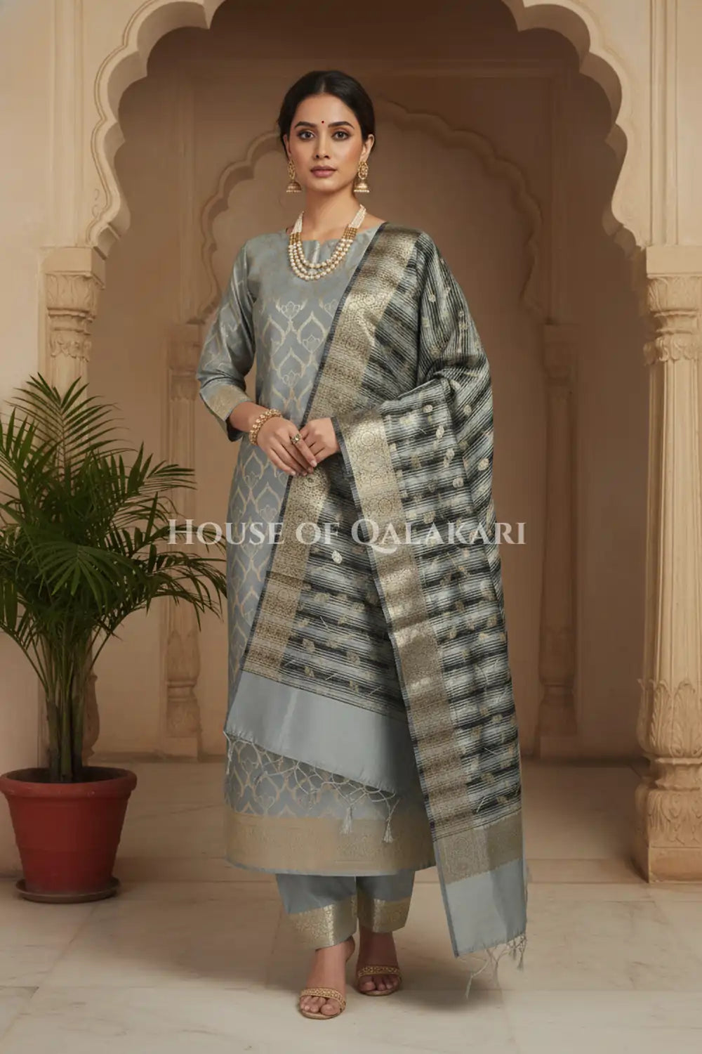 Banarasi Cotton Silk blend Unstitched Dress Material in Grey and with contrast Black-Grey striped dupatta – dramatic pose