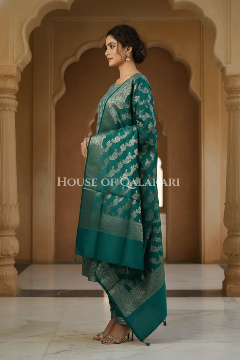 Banarasi Silk Unstitched Dress Material in Blue Grey and Deep Bluish Green contrast with Intricate Zari Buti – side pose