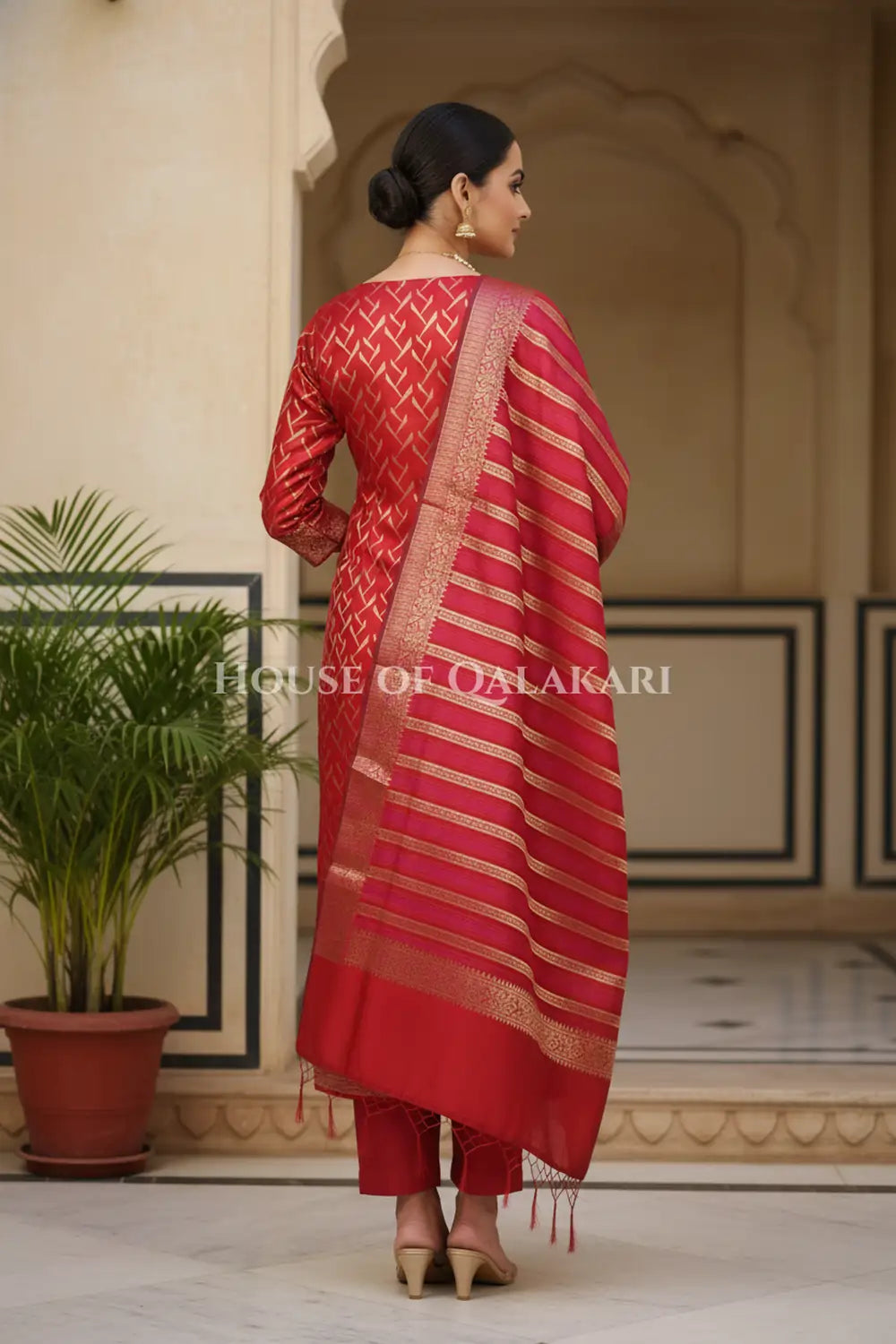 Banarasi Chanderi Cotton Unstitched Dress Material in Red and with matching horizontal zari stripe dupatta – back pose