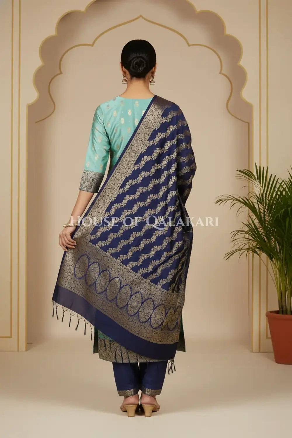 Banarasi Silk in sky blue and navy blue contrast with Intricate Zari Buti – back pose
