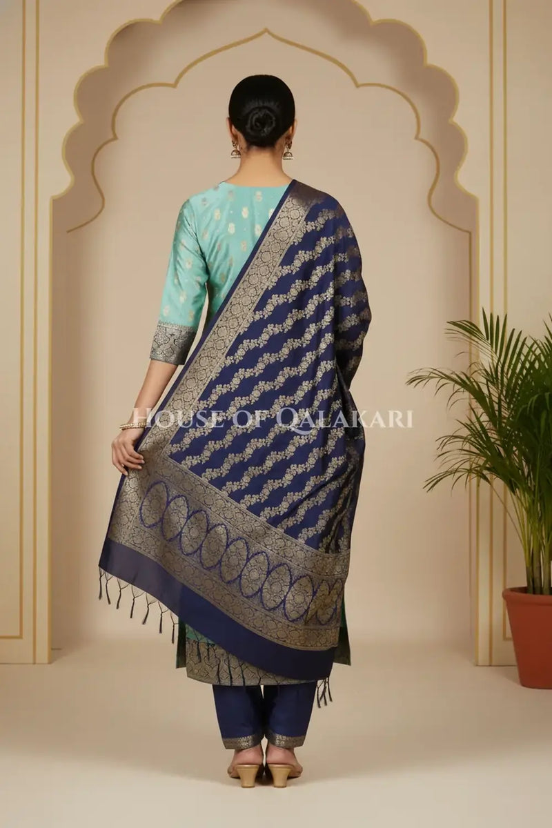 Banarasi Silk in sky blue and navy blue contrast with Intricate Zari Buti – back pose