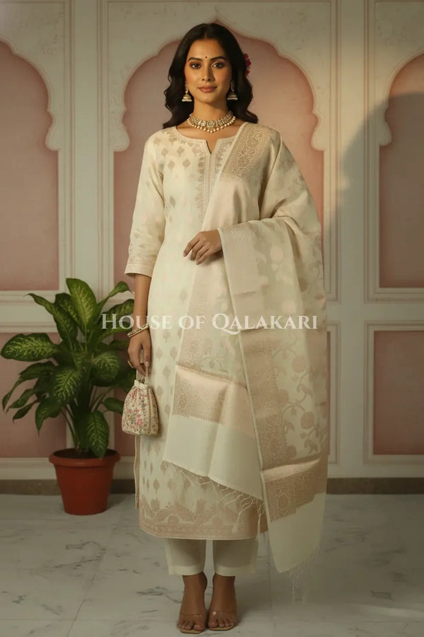 Banarasi Chanderi Cotton Unstitched Dress Material in Cream with intricate Zari Buti work – festive