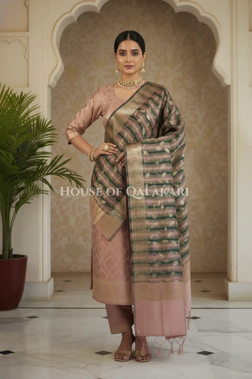 Banarasi Cotton Silk blend Unstitched Dress Material in Copper Rose and with contrast Dark Green-Copper Rose striped dupatta – dramatic pose