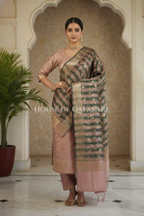 Banarasi Cotton Silk blend Unstitched Dress Material in Copper Rose and with contrast Dark Green-Copper Rose striped dupatta – dramatic pose