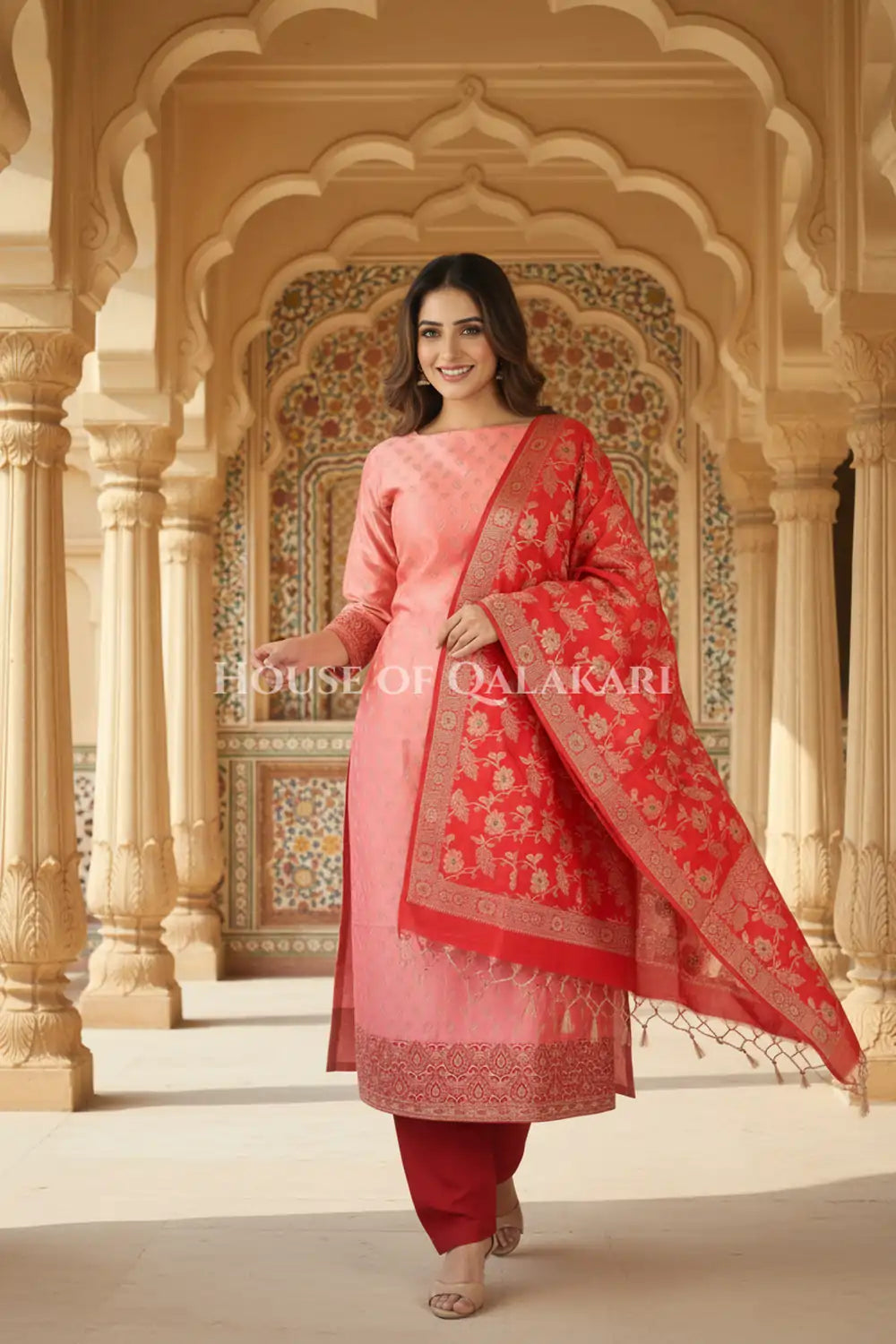Banarasi Unstitched Dress Material in Rose Pink and with all over leaf buti and resham border along with floral resham jaal dupatta – festive pose