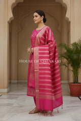 Banarasi Chanderi Cotton Unstitched Dress Material in Rani Pink and with matching horizontal zari stripe dupatta – side pose