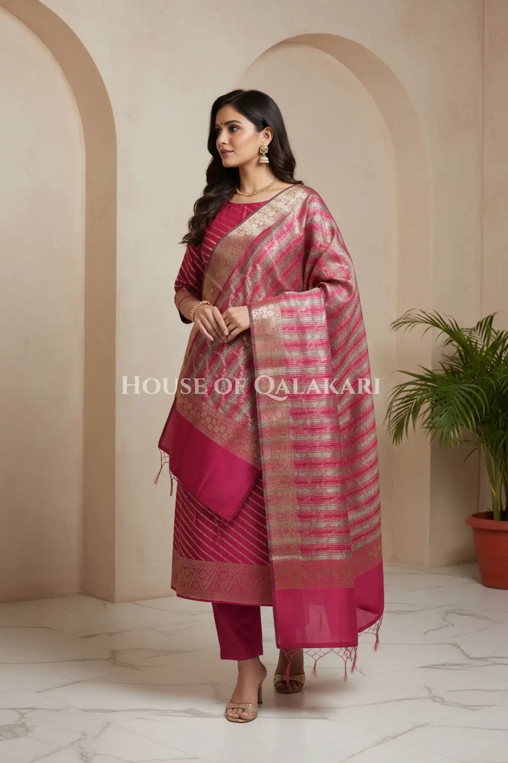 Banarasi Cotton Silk blend Unstitched Dress Material in Rani Pink and with Bandhani-Leheriya inspired work – side pose