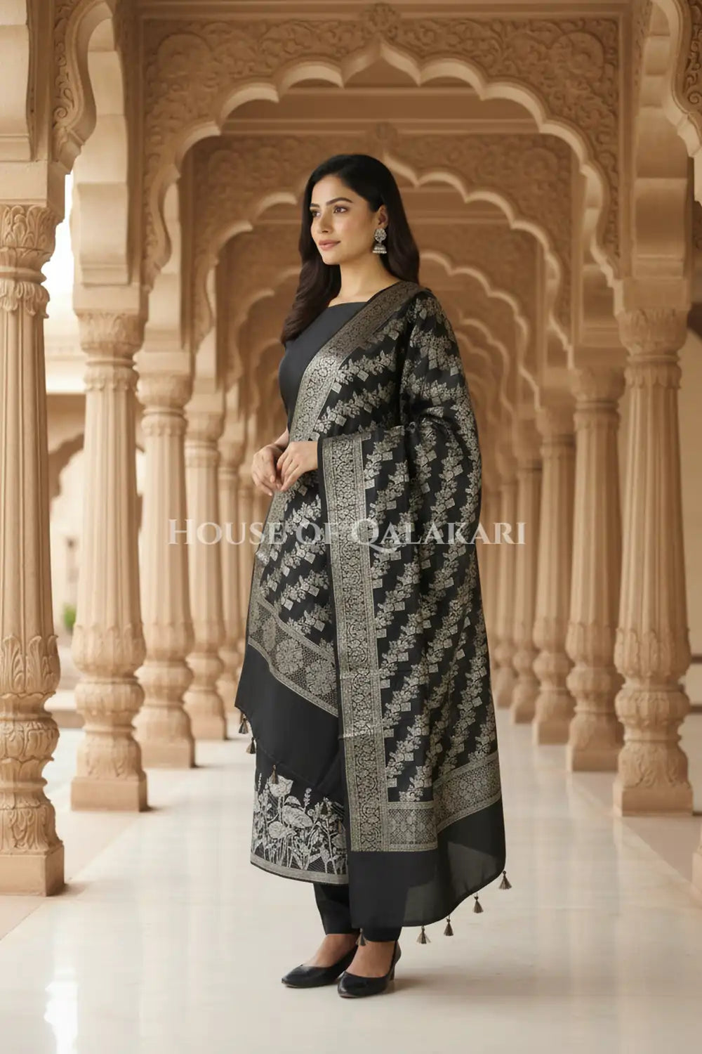 Banarasi silk Unstitched Dress Material in Black and with lotus floral border and diagonal striped zari work dupatta – side pose