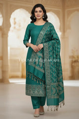 Banarasi Unstitched Dress Material in Emerald Green and with plain body and resham border and diagonally striped resham dupatta – front pose