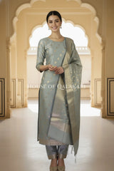 Banarasi Cotton Silk blend Unstitched Dress Material in Grey colour with Intricate Zari Diamond Buti – festive pose