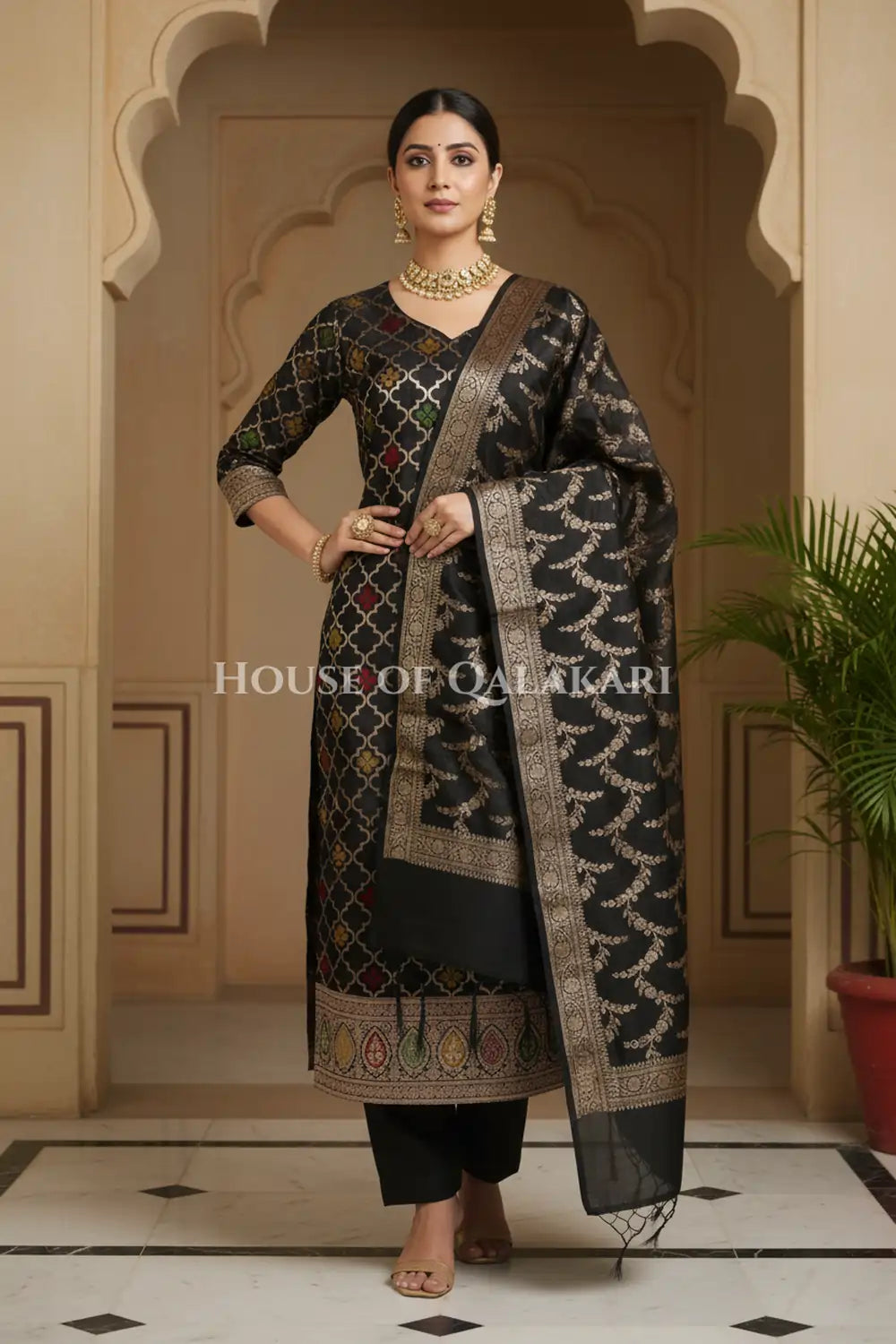 Banarasi Chanderi Cotton Unstitched Dress Material in Black and with matching floral vine jaal dupatta – dramatic pose