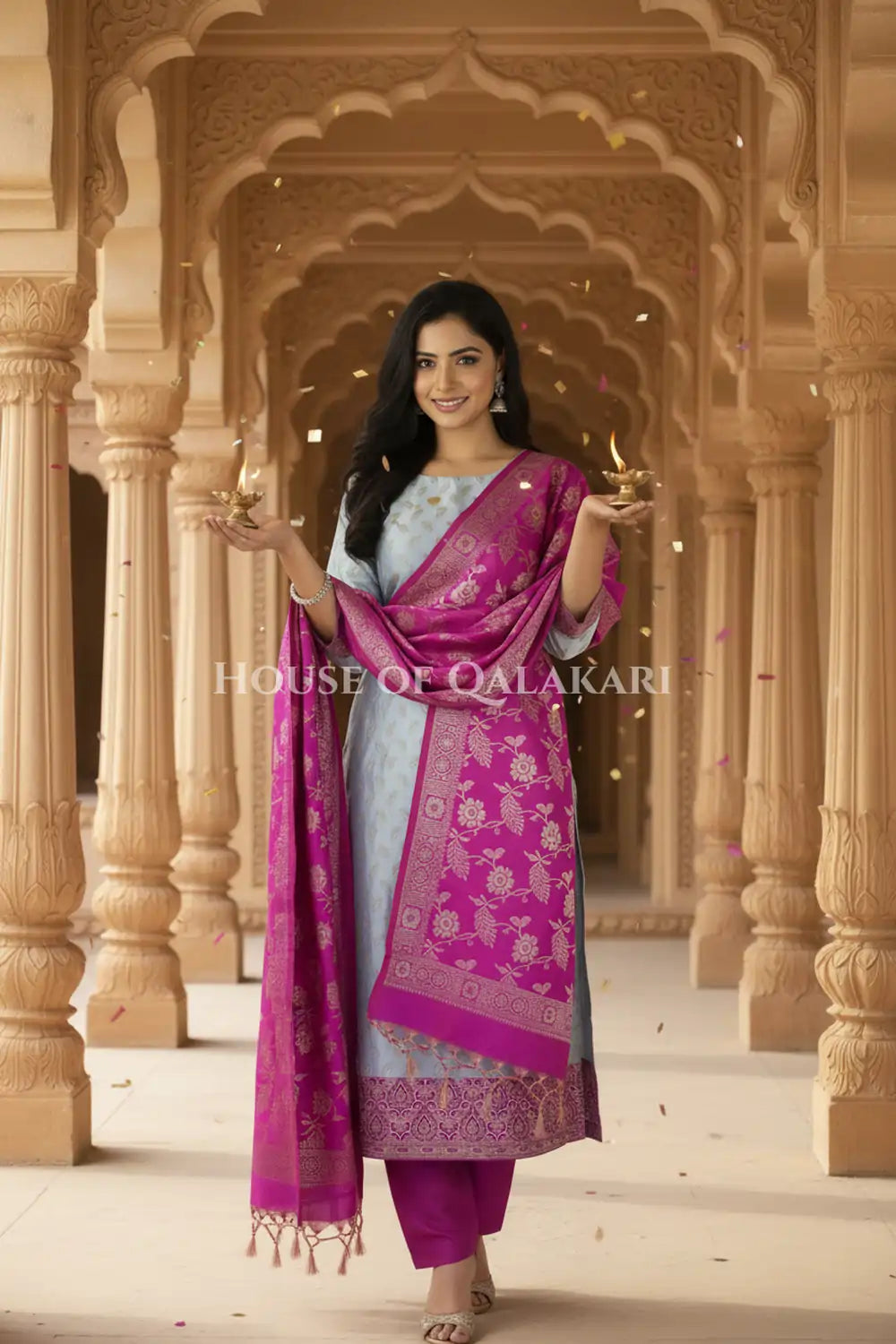 Banarasi Unstitched Dress Material in Light Blue and with all over leaf buti and resham border along with floral resham jaal dupatta – festive pose