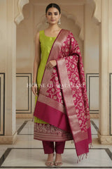 Banarasi silk Unstitched Dress Material in Olive Green and Wine Red contrast with Intricate Zari Buti – front pose