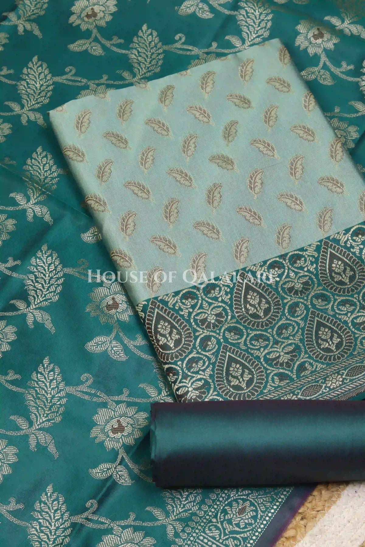 Banarasi Unstitched Dress Material in Silver Green and with all over leaf buti and resham border along with floral resham jaal dupatta – product