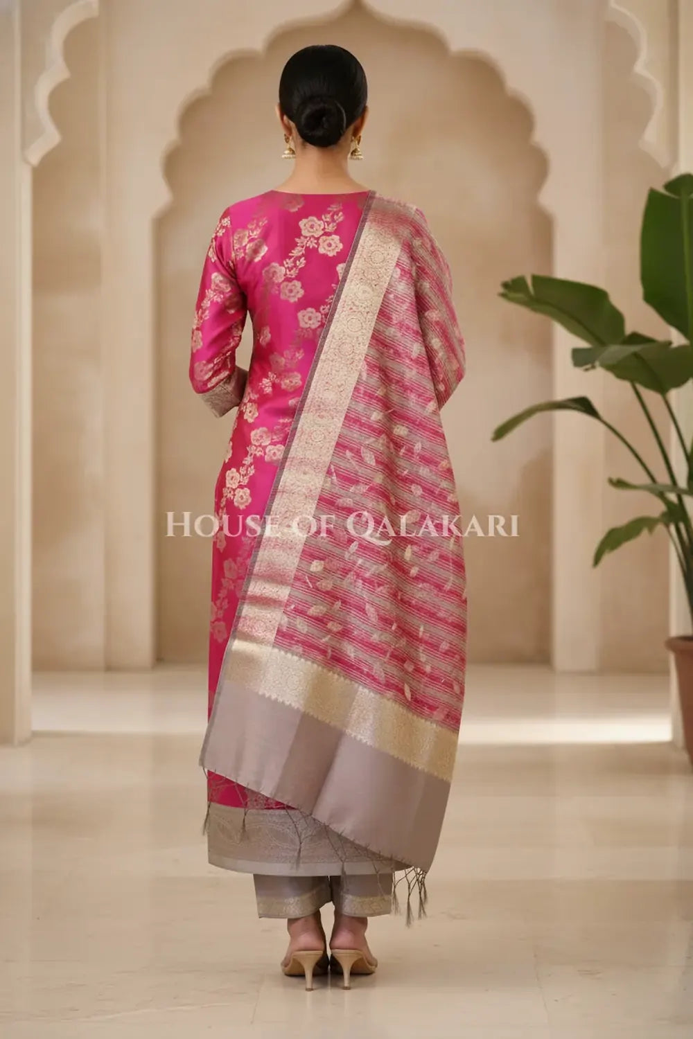 Banarasi Cotton Silk blend Unstitched Dress Material in rani pink and silver grey contrast with Intricate Zari Buti – back pose