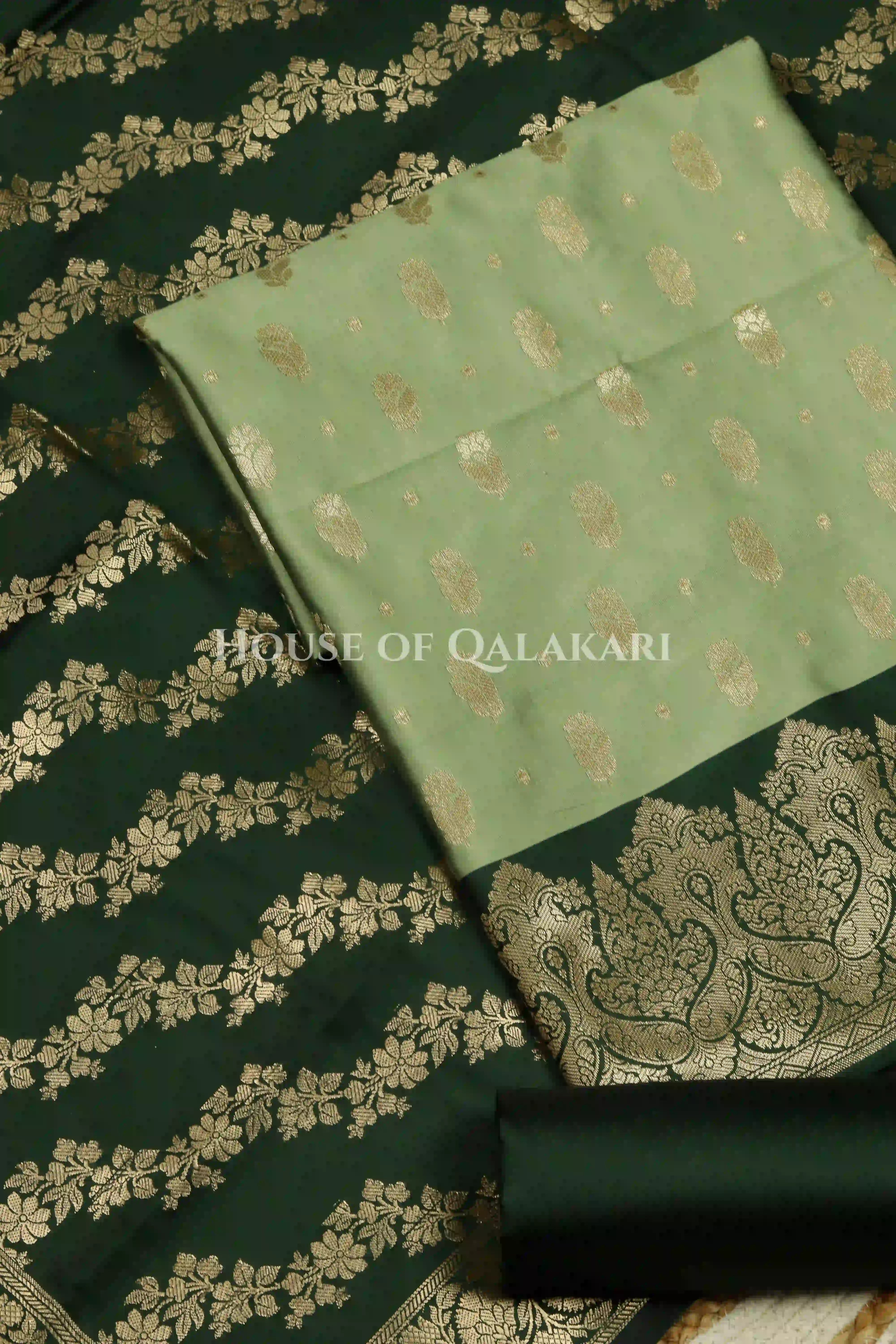 Banarasi Silk in pistachio green and bottle green contrast with Intricate Zari Buti – product