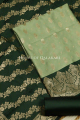 Banarasi Silk in pistachio green and bottle green contrast with Intricate Zari Buti – product