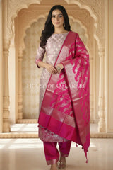 Banarasi Silk Unstitched Dress Material in Light Purple and rani pink contrast with Intricate Zari Buti – front pose