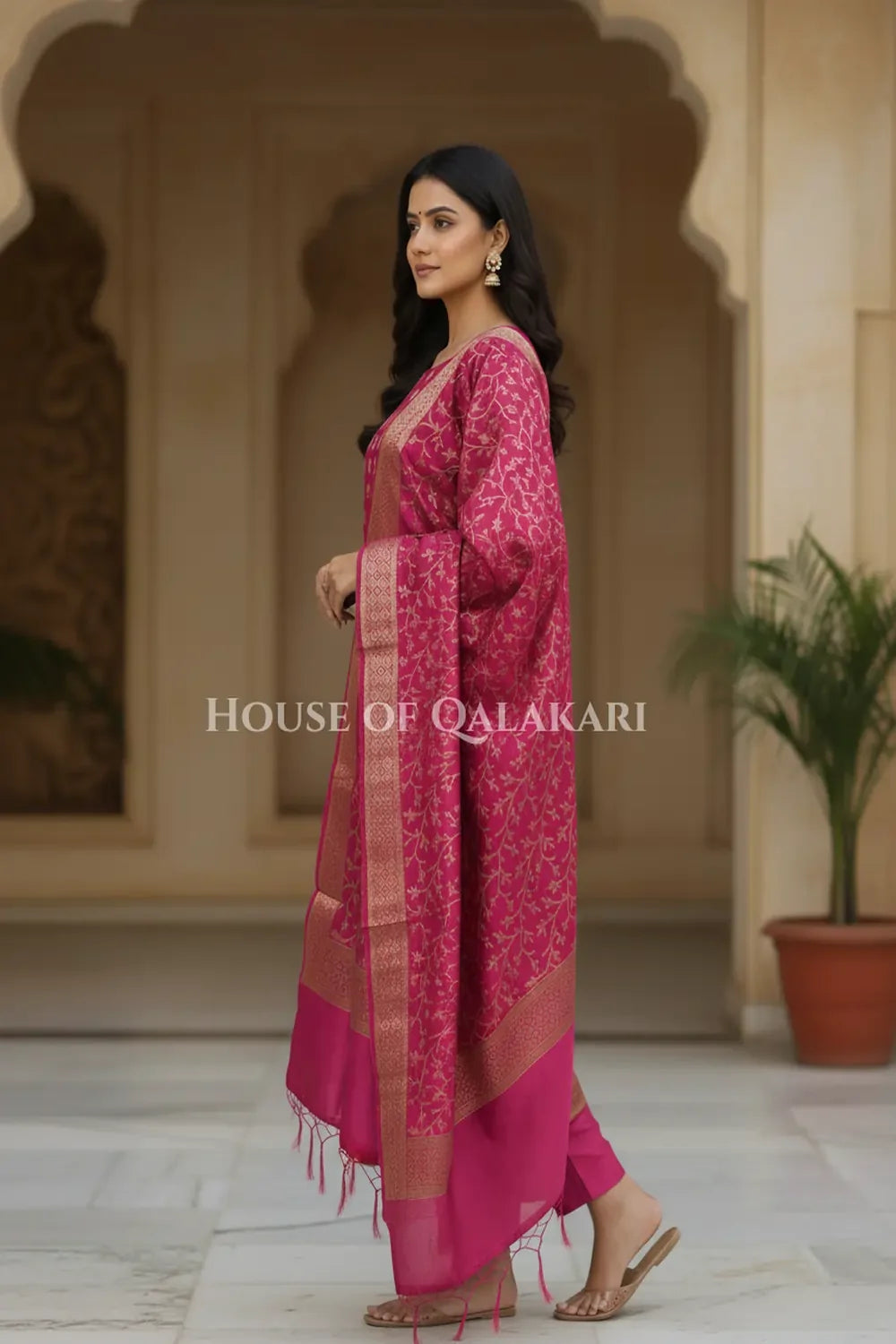 Banarasi Cotton Silk blend Unstitched Dress Material in Rani Pink and with matching floral vine jaal dupatta – side pose