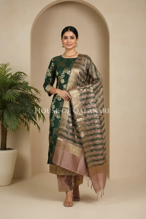 Banarasi Cotton Silk blend Unstitched Dress Material in deep emerald green and rose gold contrast with Intricate Zari Buti – front pose
