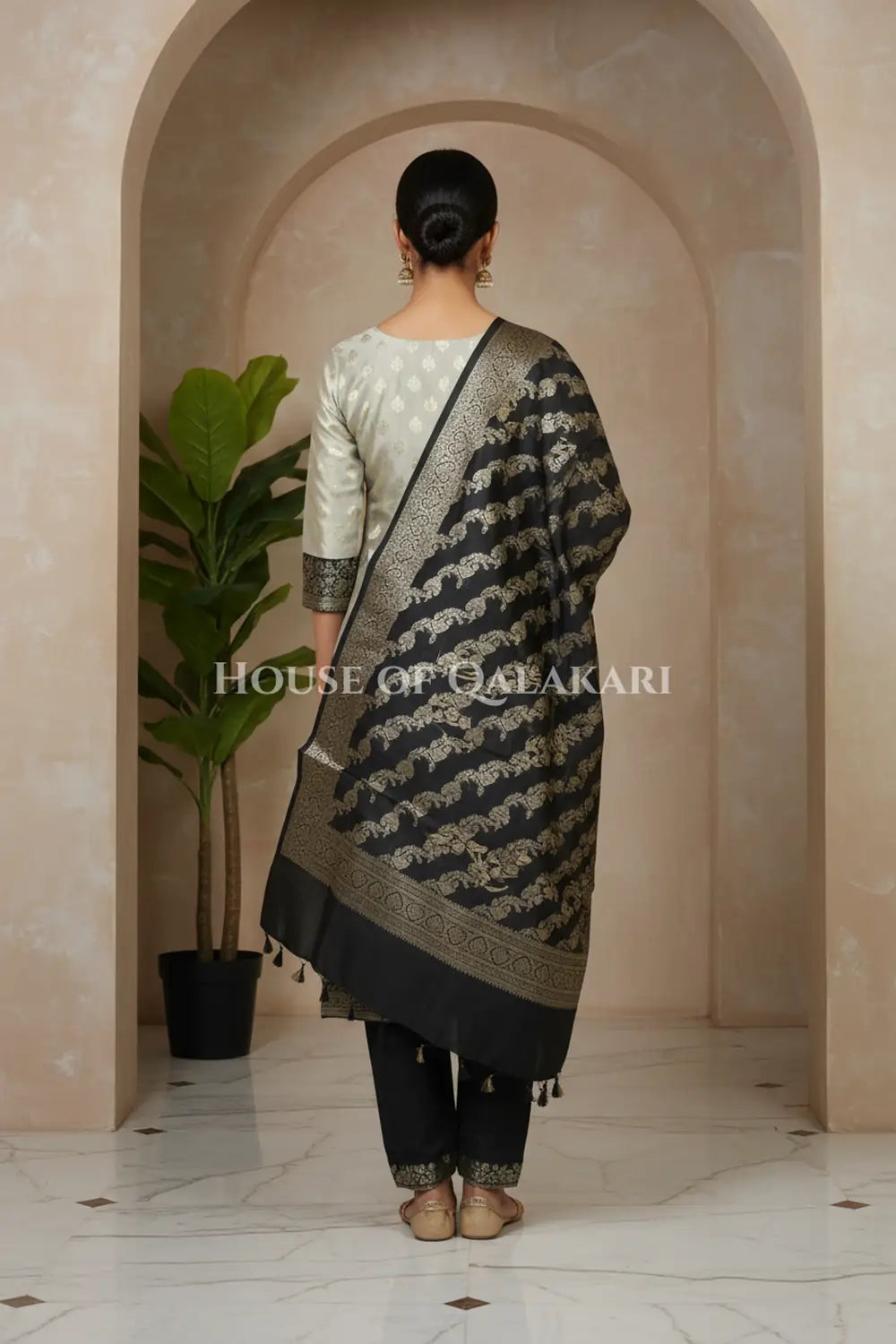 Banarasi Silk Unstitched Dress Material in light grey and black contrast with Intricate Zari Buti – back pose