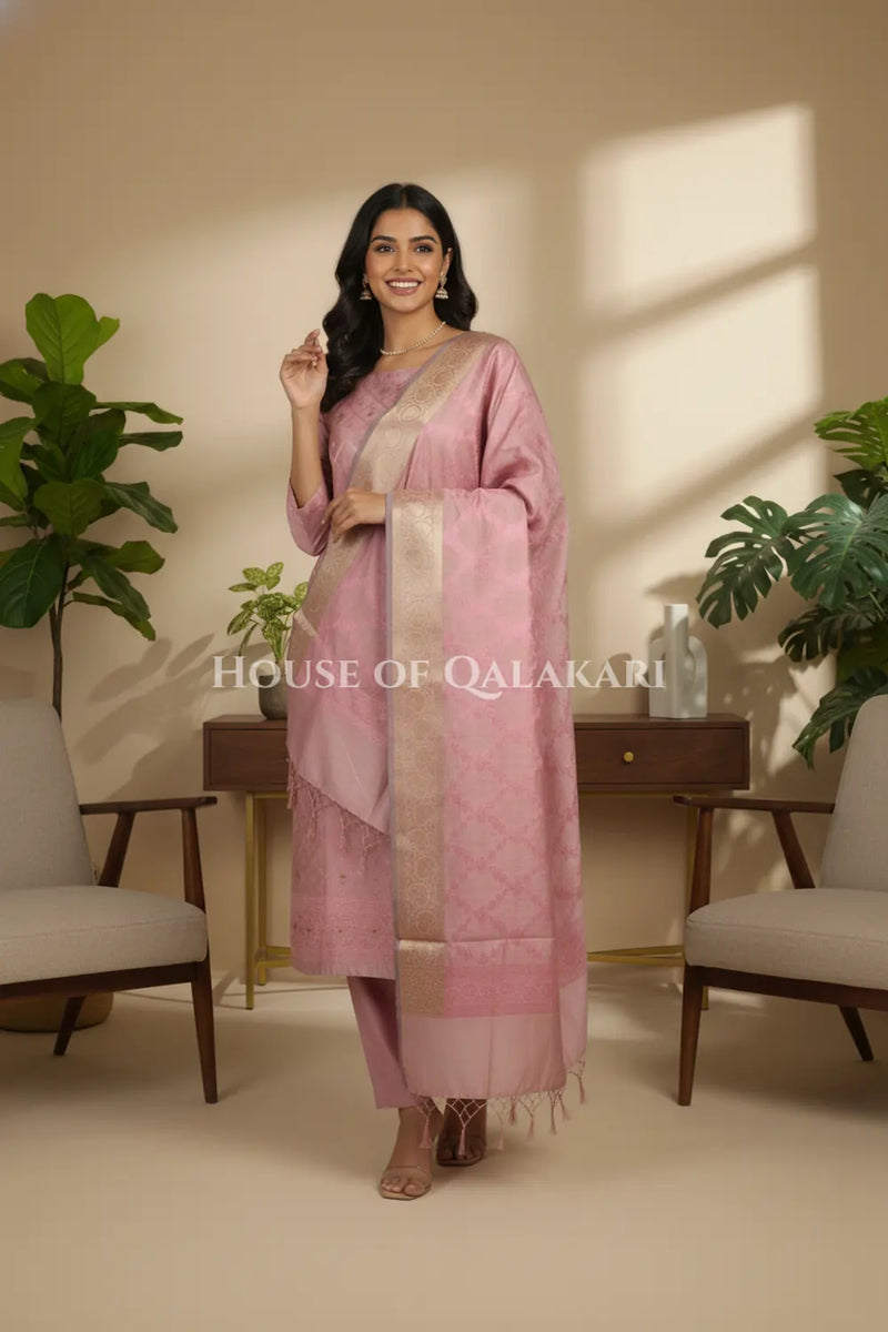 Banarasi Unstitched Dress Material in Dusky Rose diamond Chokdi resham work kurta and zari border – festive pose