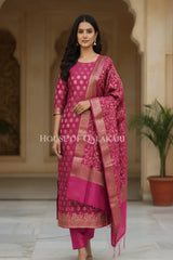 Banarasi Cotton Silk blend Unstitched Dress Material in Rani Pink and with matching floral vine jaal dupatta – front pose