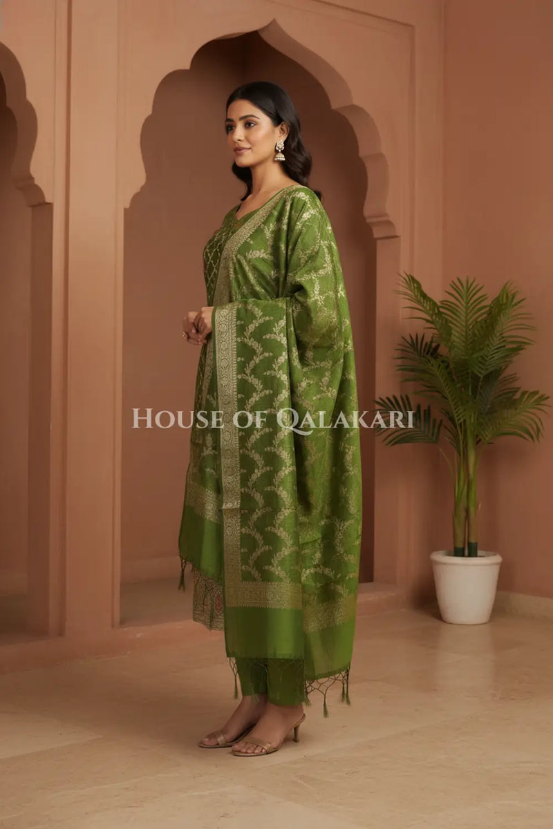 Banarasi Chanderi Cotton Unstitched Dress Material in Mehndi and with matching floral vine jaal dupatta – side pose