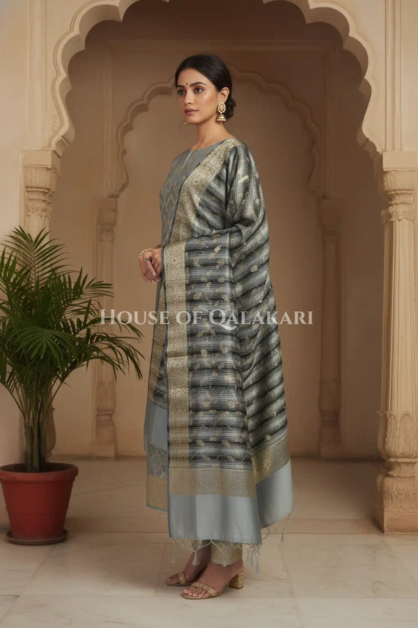 Banarasi Cotton Silk blend Unstitched Dress Material in Grey and with contrast Black-Grey striped dupatta – side pose